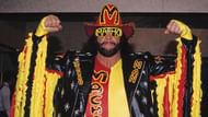 Randy Savage posing in a WWE photoshoot